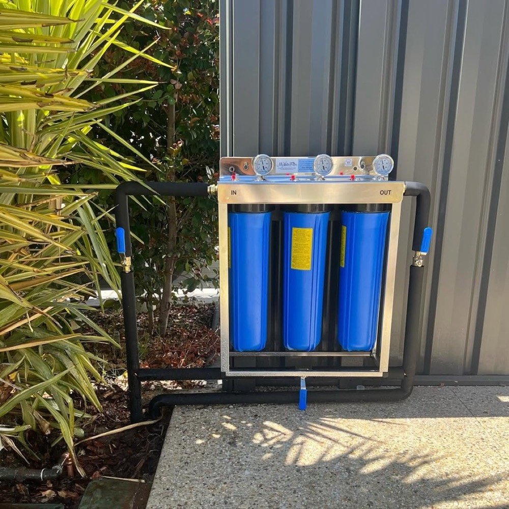 Triple-cartridge water filtration system